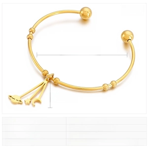 Detail of gold moon and star stainless steel bangle with dimensions and weight specs