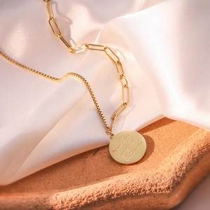 Double layered gold steel necklace with box chain and Love pendant on silk
