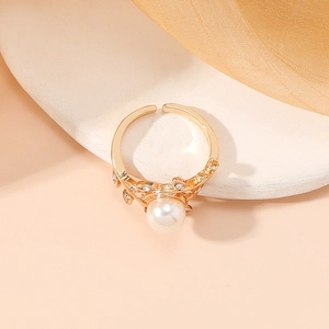 Golden adjustable pearl ring with sparkling rhinestones in floral design