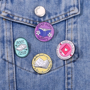 Creative book collection enamel pins on blue denim jacket pocket for book lovers