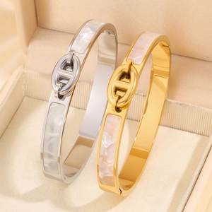 Golden and silver titanium steel bracelets with white pearl shell inlay and H-link clasp