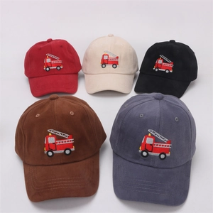 Detail showing five colors of children's baseball caps with cartoon fire truck embroidery