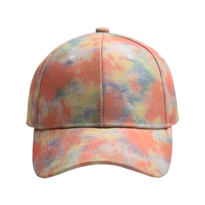 Detail of colorful tie-dye cotton baseball cap with six-panel structure and curved brim