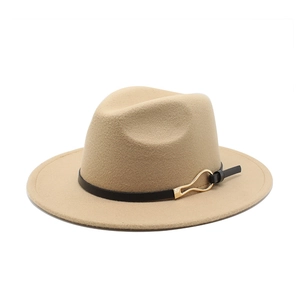 Detail of beige wool felt fedora featuring a black leather band and gold metal buckle