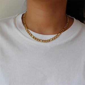 Gold plated stainless steel Figaro chain necklace for men and women worn on a model