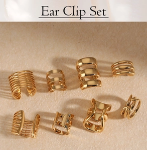 Detailed set of eight golden stainless steel ear clips with minimalist geometric designs