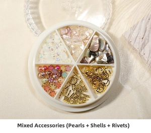 Mixed nail art charms set with pearls, shells, and metal rivets in a six-grid round case