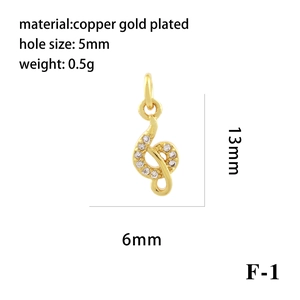 Macro view of 18K gold plated treble clef pendant with micro-inlaid zircon and dimensions