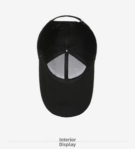 Detail view of the black baseball cap interior with six-panel structure and metal buckle