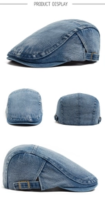 Dettagli del berretto newsboy in denim lavato con fibbie di regolazione in metallo