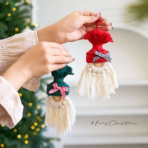 Handmade knitted Christmas gnome ornaments with cotton tassels for festive tree decoration