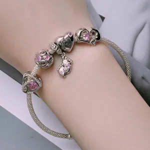 S925 silver charm bracelet with pink zircon heart and Mummy baby footprints pendants
