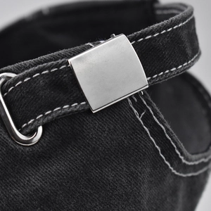 Detail of retro washed cotton baseball cap with adjustable metal buckle and contrast stitching