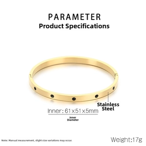 Detailed view of golden stainless steel oval bangle dimensions 61x51x5mm and 17g weight