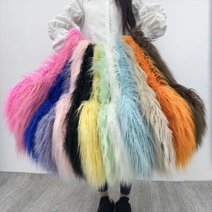 Selection of colorful faux fur strips in pink, blue and yellow for heart-shaped bags