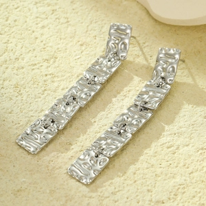 Silver rectangular drop earrings with hand-hammered texture and layered fringe design