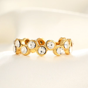 Macro shot of gold-plated titanium ring with micro-pave wave-set cubic zirconia stones
