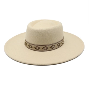 Detail of beige wide brim wool fedora hat with ethnic woven band for winter fashion