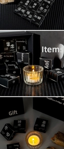 Detailed view of luxury black gold scented candle set with elegant glass candle holder