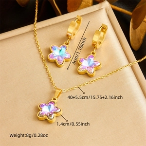 Gold stainless steel jewelry set with purple iridescent flower charms and dimensions