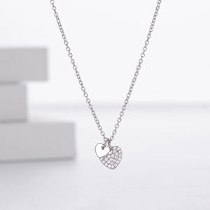 Elegant S925 sterling silver interlocking heart necklace with pavé cubic zirconia