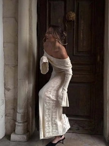 Elegant off-shoulder crochet knit maxi dress with flared sleeves in creamy white
