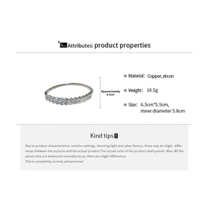 Détails du bracelet cœur argenté avec pavé de zircons et dimensions précises affichées