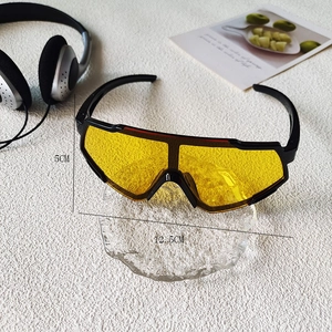 Detail of black sports sunglasses with yellow lenses and 12.5cm frame width size marking