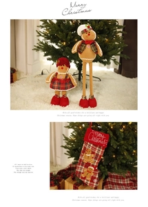 Gingerbread man plush dolls and matching Christmas stockings with festive plaid details