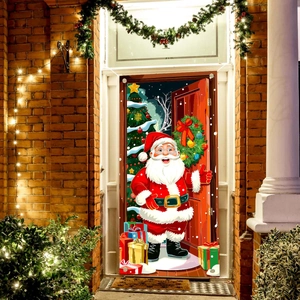 Outdoor Santa Claus Christmas door banner with festive holiday print on red brick wall
