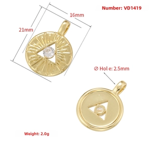 Detailed view showing front and back of 18K gold sunburst round pendant with zircon stone