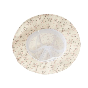 Floral print baby bucket hat with pink flower pattern and breathable mesh lining