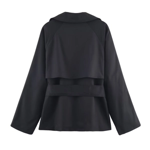 Detail of black windbreaker back with raglan sleeves and layered windproof design