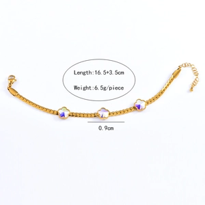 Detail of gold floral bracelet with iridescent crystals, lobster clasp and size labels