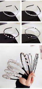 Detail shot of elegant metal headbands with sparkling rhinestones and pearls