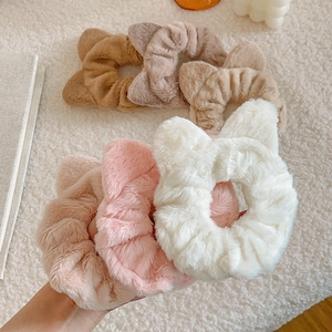 Cute plush cat ear hair scrunchies set in pastel colors with soft faux fur texture