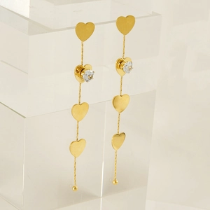 Long gold tassel earrings with multiple heart shapes and sparkling zircon crystals