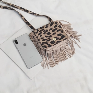 Kids leopard print crossbody bag with stylish long fringe and golden metal buckle