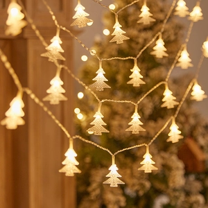 Warm LED Christmas tree string lights with hollow metal mesh design for festive home decor