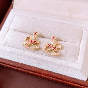 Vintage 18K gold plated rocking horse earrings with red enamel and pavé crystals