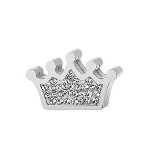 Detailed view of a silver crown charm featuring intricate rows of sparkling crystals