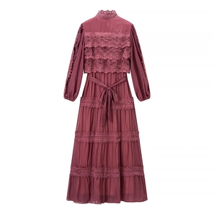 Detailed back view of reddish-brown lace dress featuring crochet hollow out tier design