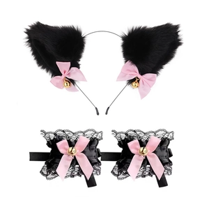 Detail of plush cat ear headband and lace wristbands with pink bows and bells