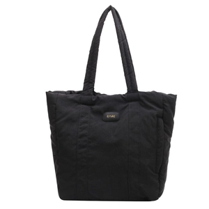 Large black quilted nylon tote bag with shoulder straps for commuting and casual use