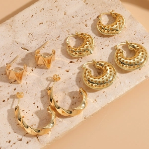 Luxurious geometric 14K gold plated earring set with hollow patterns and polished C-shape design