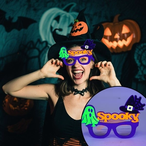 Halloween purple felt glasses with Spooky letters and ghost decor worn by a model