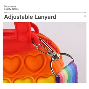 Rainbow silicone pop-it coin purse for kids with adjustable strap and metal buckle detail
