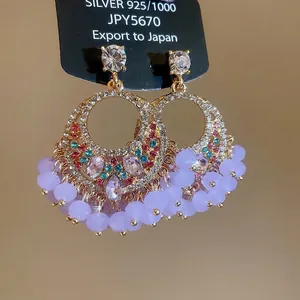 Elegant 925 silver needle drop earrings with crystals and purple frosted tassels