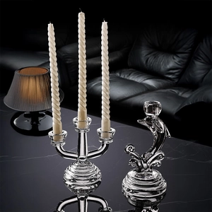 Nordic 3-arm glass candle holder set with elegant spiral candles on black marble table