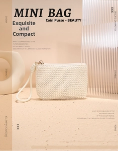 Close-up of cream woven mini coin purse with metal zipper and matching wrist strap